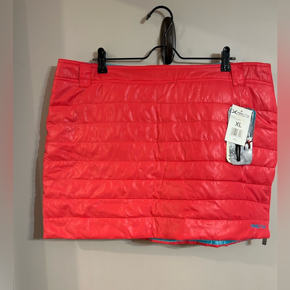 NWT Arctix women’s size XL puffer snow skirt. Bright orange, thermatech